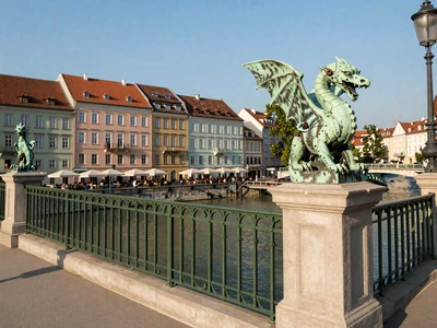 Ljubljana Dragon Bridge over Ljubljanica River with outdoor cafes, romantic date spot for Slovenian singles
