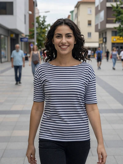 Gentiana, 26, Albanian woman from Prishtina on a modern city boulevard